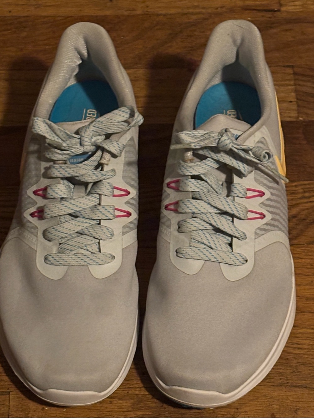 Nike Light Gray Sneakers with Pink and Yellow Accents